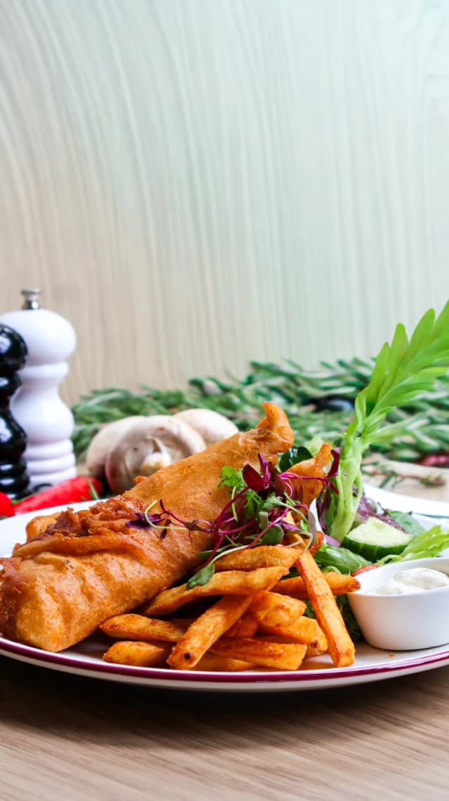 Beer battered barramundi at Milano Cafe Bar Newstead